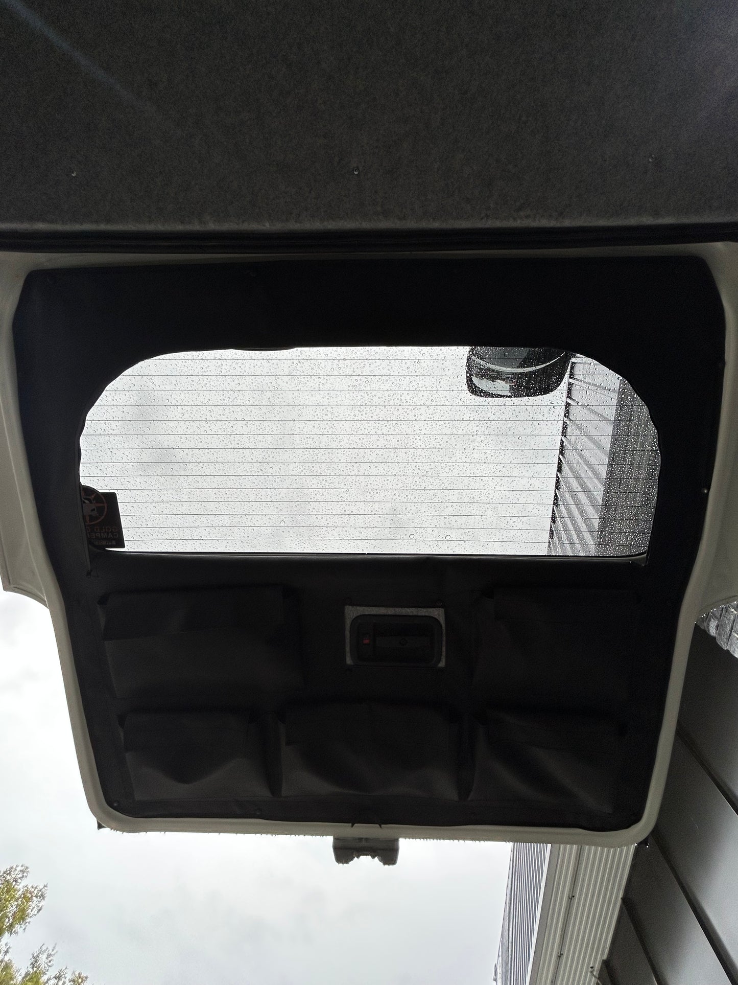 Toyota Hiace 200 Series: Rear tailgate shade and storage system