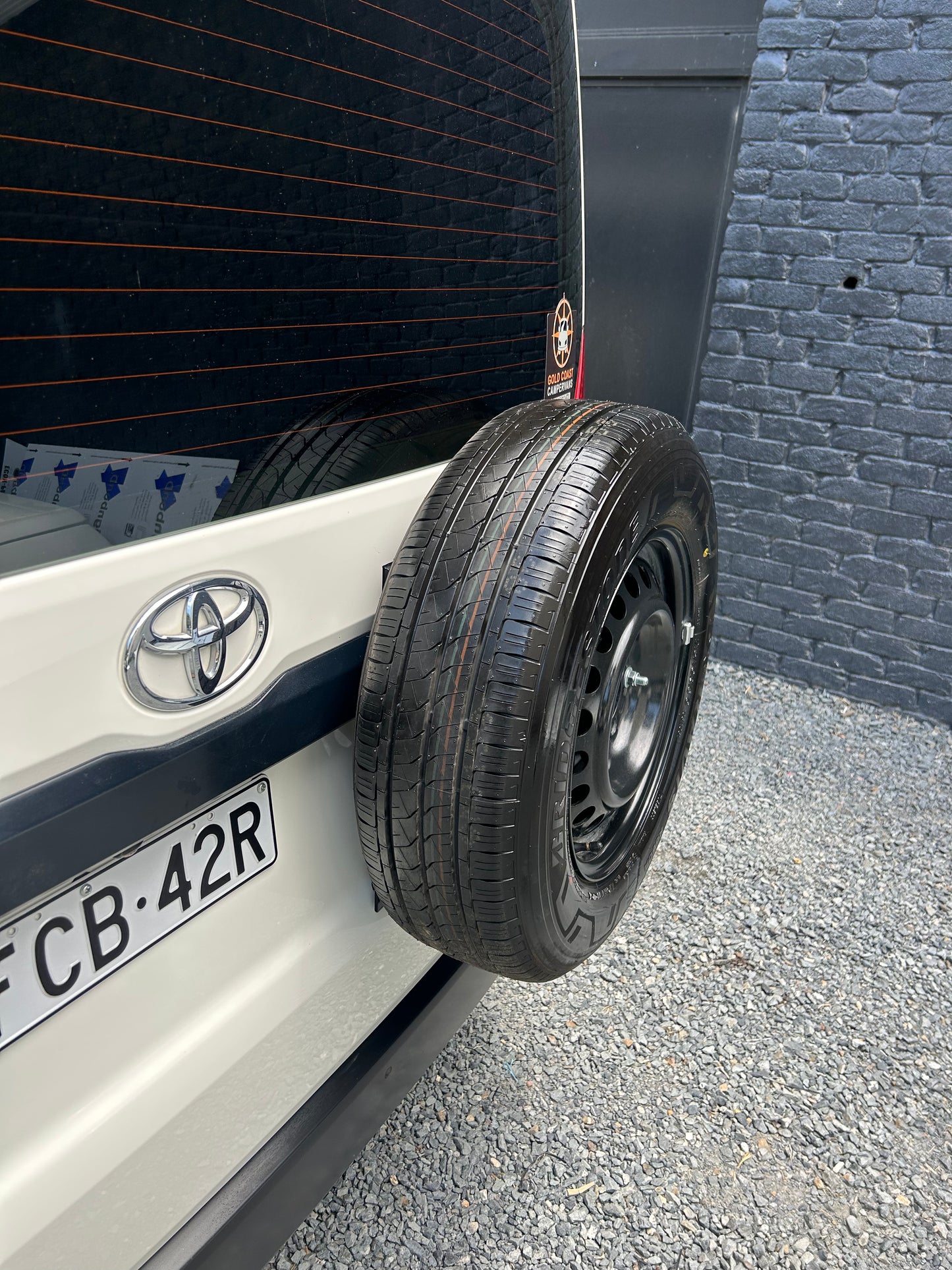 Universal spare wheel carrier